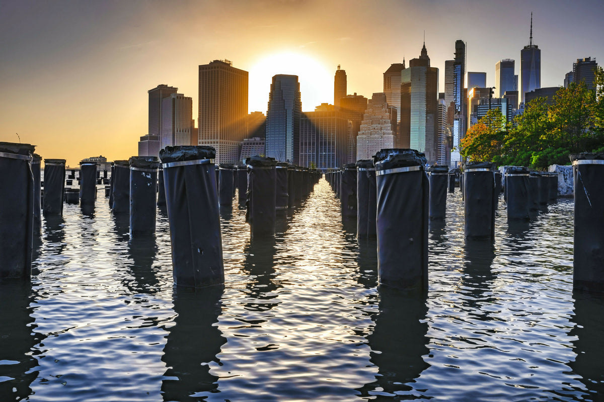 New York City, East River Manhattan, Lower Manhattan Downtown Skyline at Sunrise from Brooklyn Bridge Park – A Beautiful View