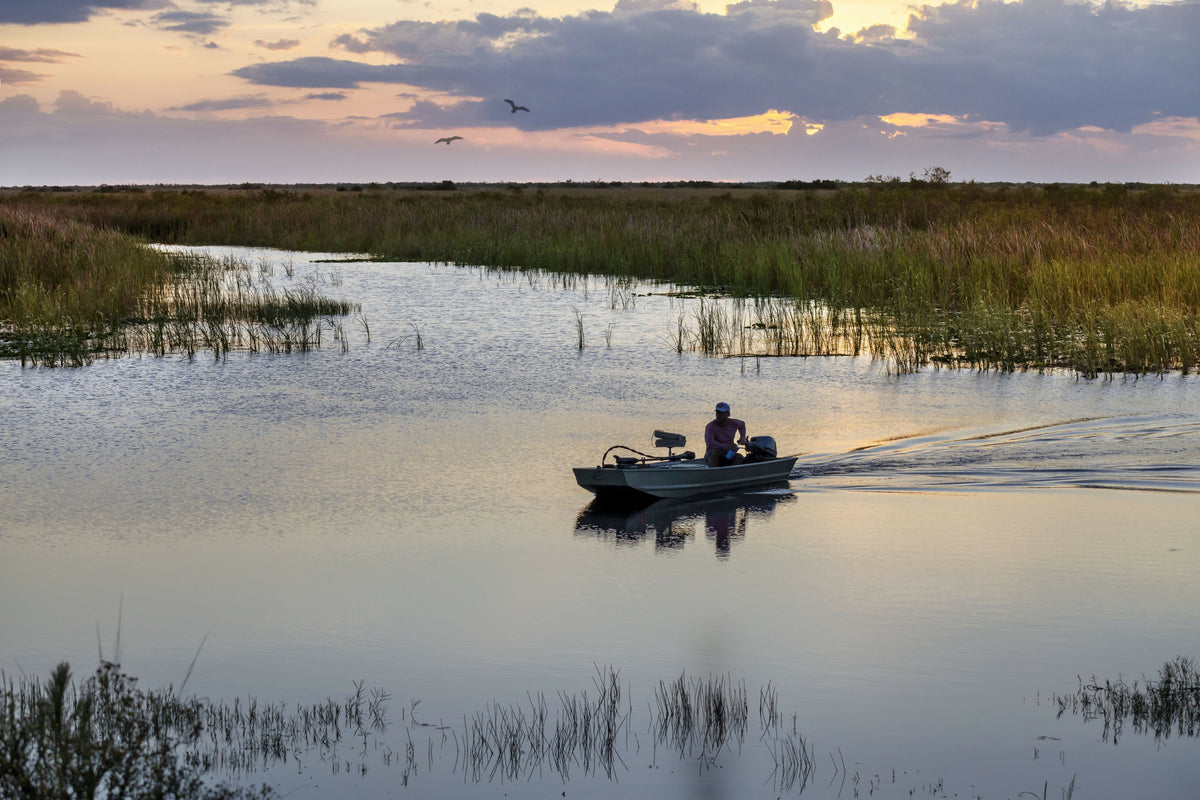 Florida, Everglades, Arthur R. Marshall Loxahatchee Wildlife Refuge in Boynton Beach, Man in Small Boat
