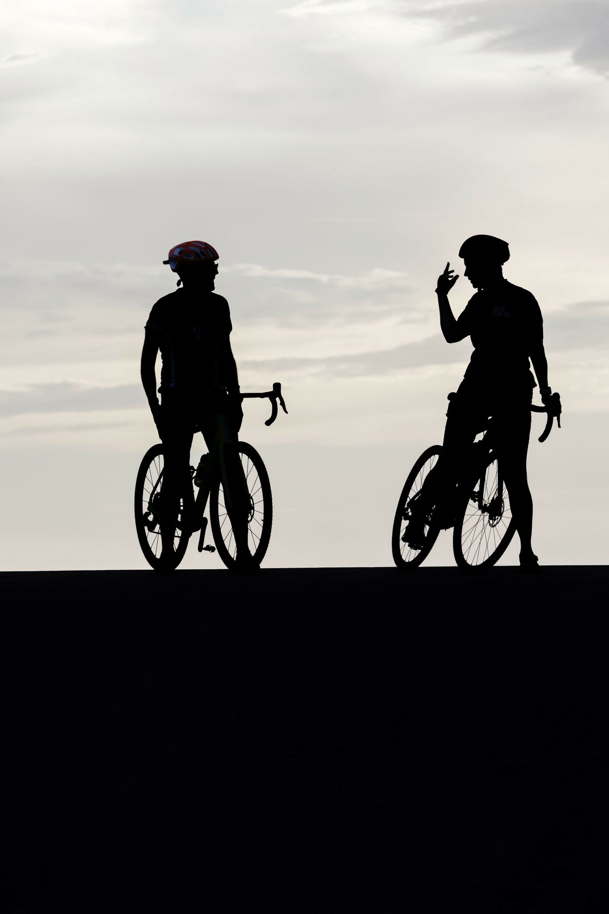 Silhouette of 2 Bicycle Riders