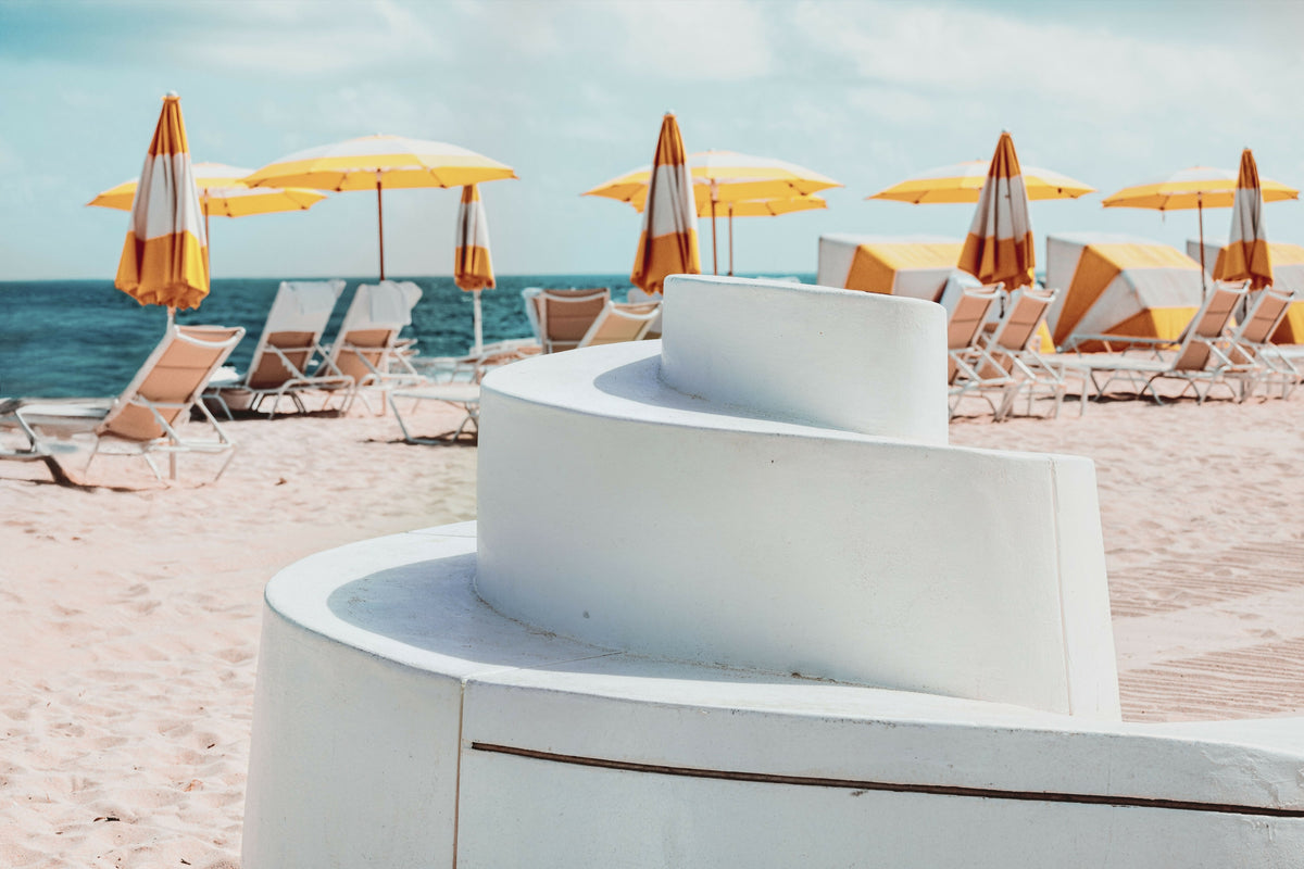 Florida, Fort Lauderdale, Beach with Yellow Umbrellas and Part of the Wave Wall on Ocean Drive – A Serene View