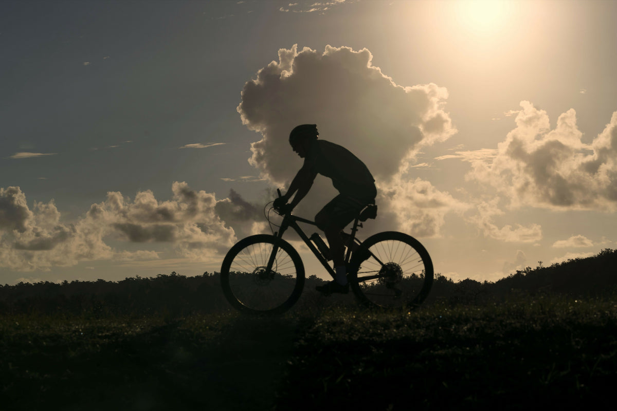 Silhouette of Man Riding Bicycle