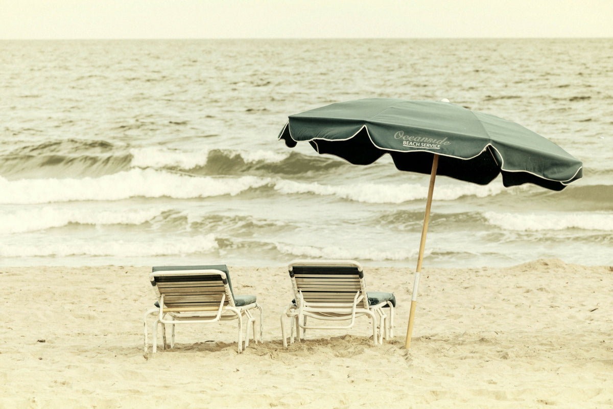 Beach Scene with Lounge Chairs and Umbrella